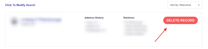 Screenshot of a webpage showing a blurred out personal record with categories such as name, address history, and relatives. A red button labeled “DELETE RECORD” is on the right side and indicated by a red arrow.