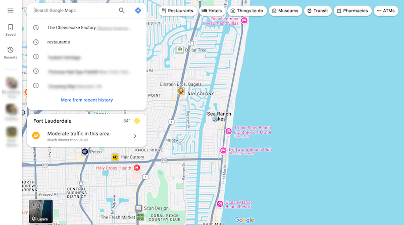 A screenshot of a map showing Fort Lauderdale, Florida, and surrounding areas. The map includes locations of restaurants, pharmacies, and hotels near the coastline. A search window displays "The Cheesecake Factory" with related search suggestions.