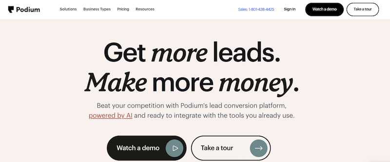Screenshot of Podium's homepage featuring a large headline "Get more leads. Make more money." with options to watch a demo or take a tour, and a mention of AI-powered online reputation management tools