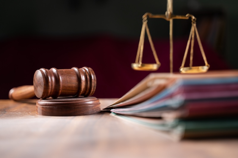 Court desk with books and other items.