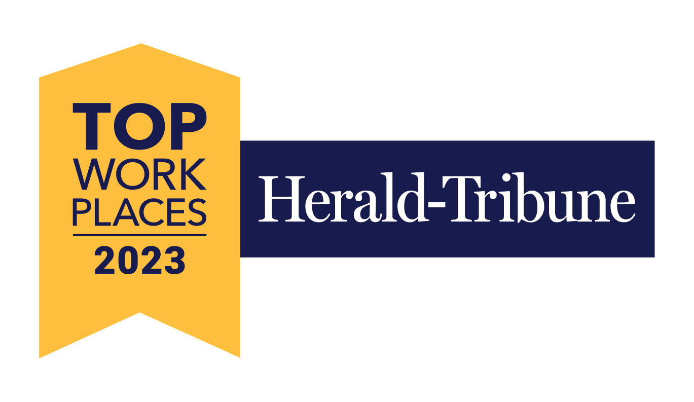 A banner with a yellow ribbon on the left featuring the text "Top Workplaces 2023" in dark blue, and a navy blue rectangle on the right with the white text "Herald-Tribune.